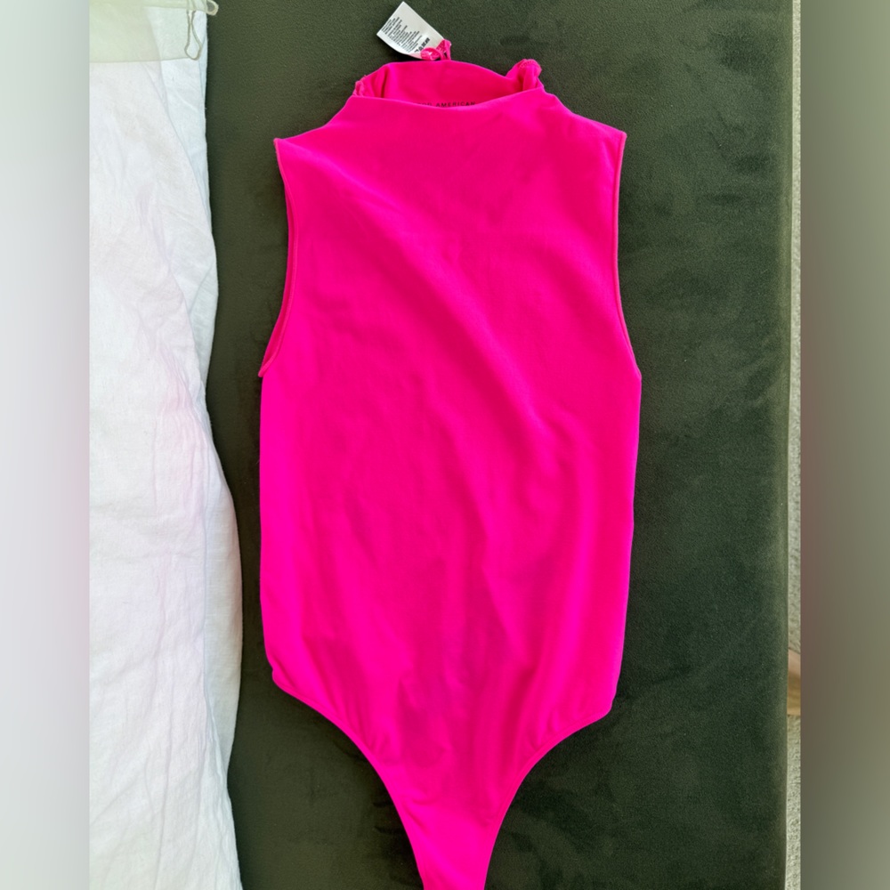 Hot pink body suit